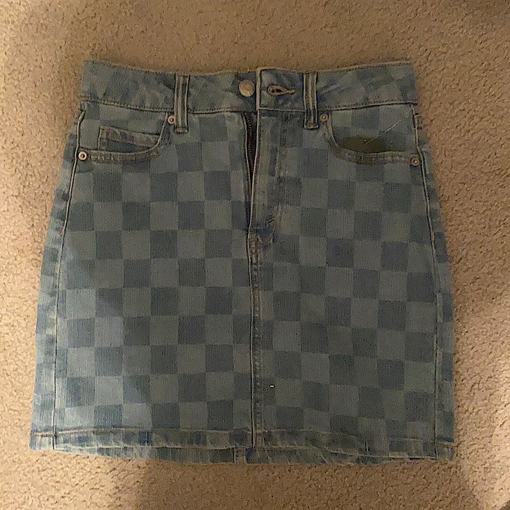 A Jean skirt with a checkered pattern